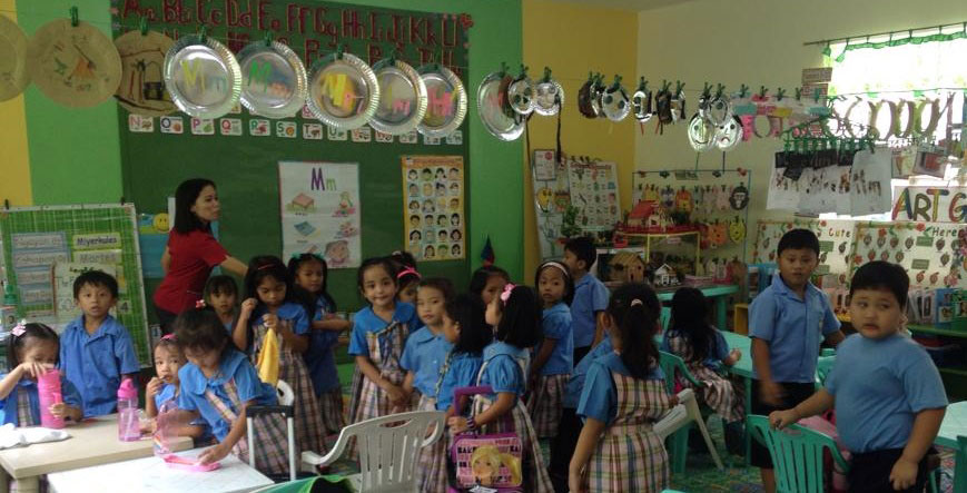 Kinder pupils in their new classroom