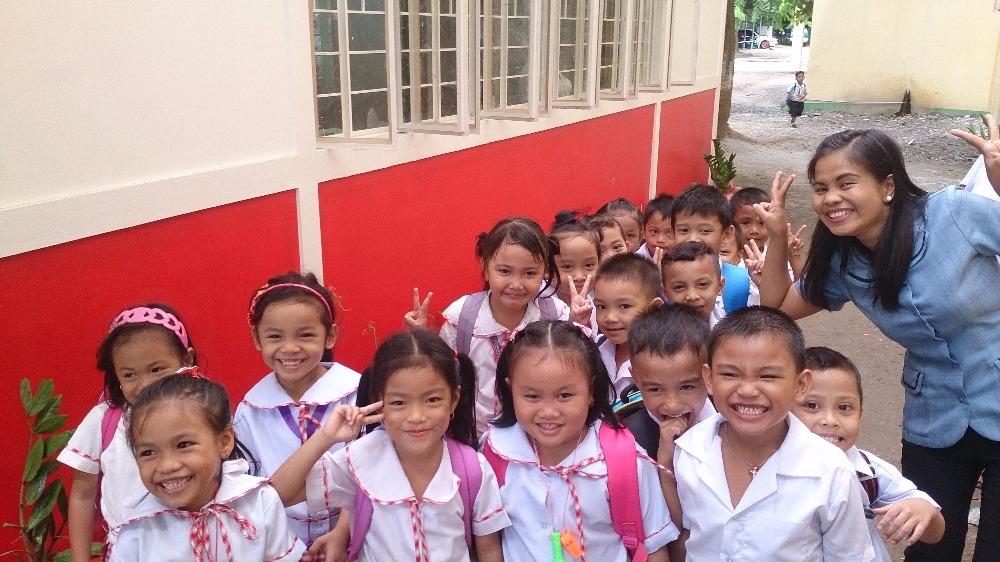 Kinder pupils at new classroom