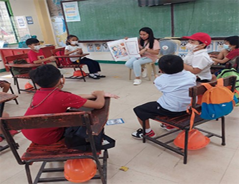 Teacher reading to students