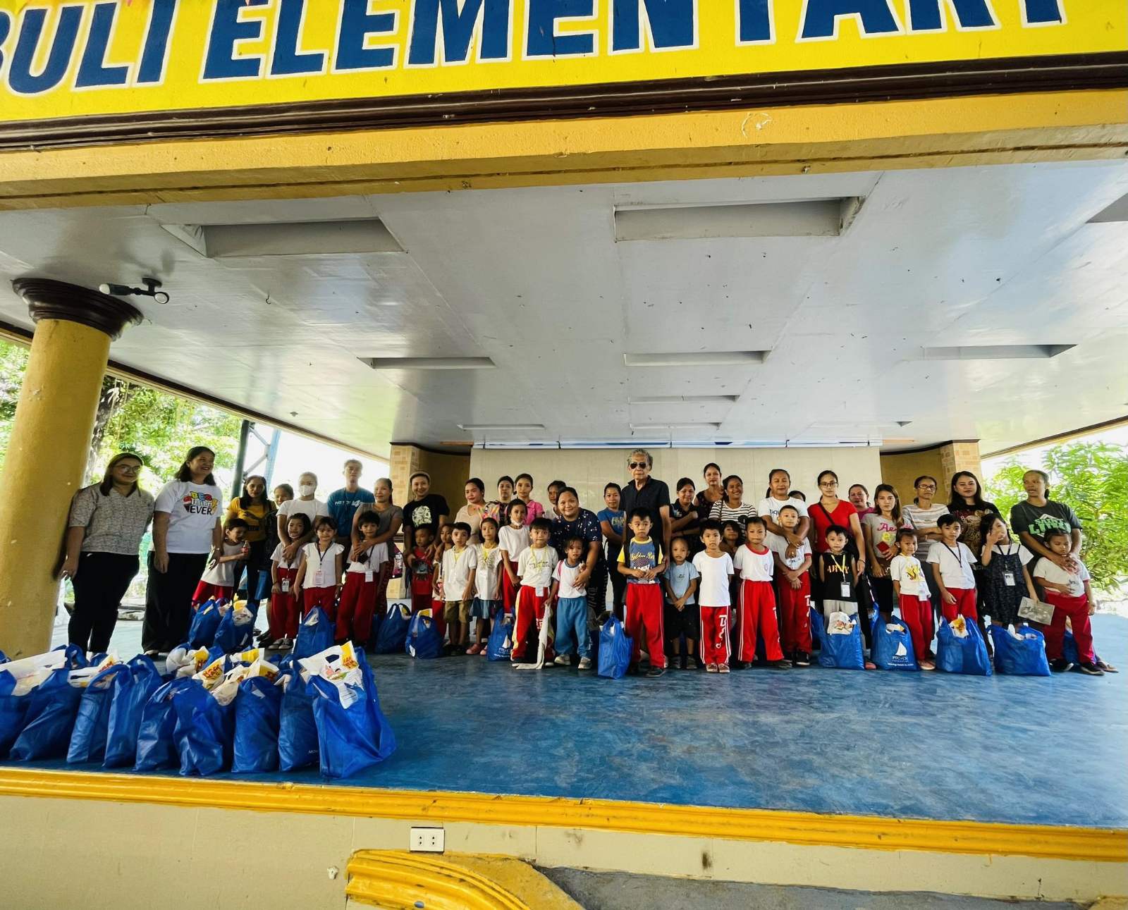 Community group photo at Buli Elementary